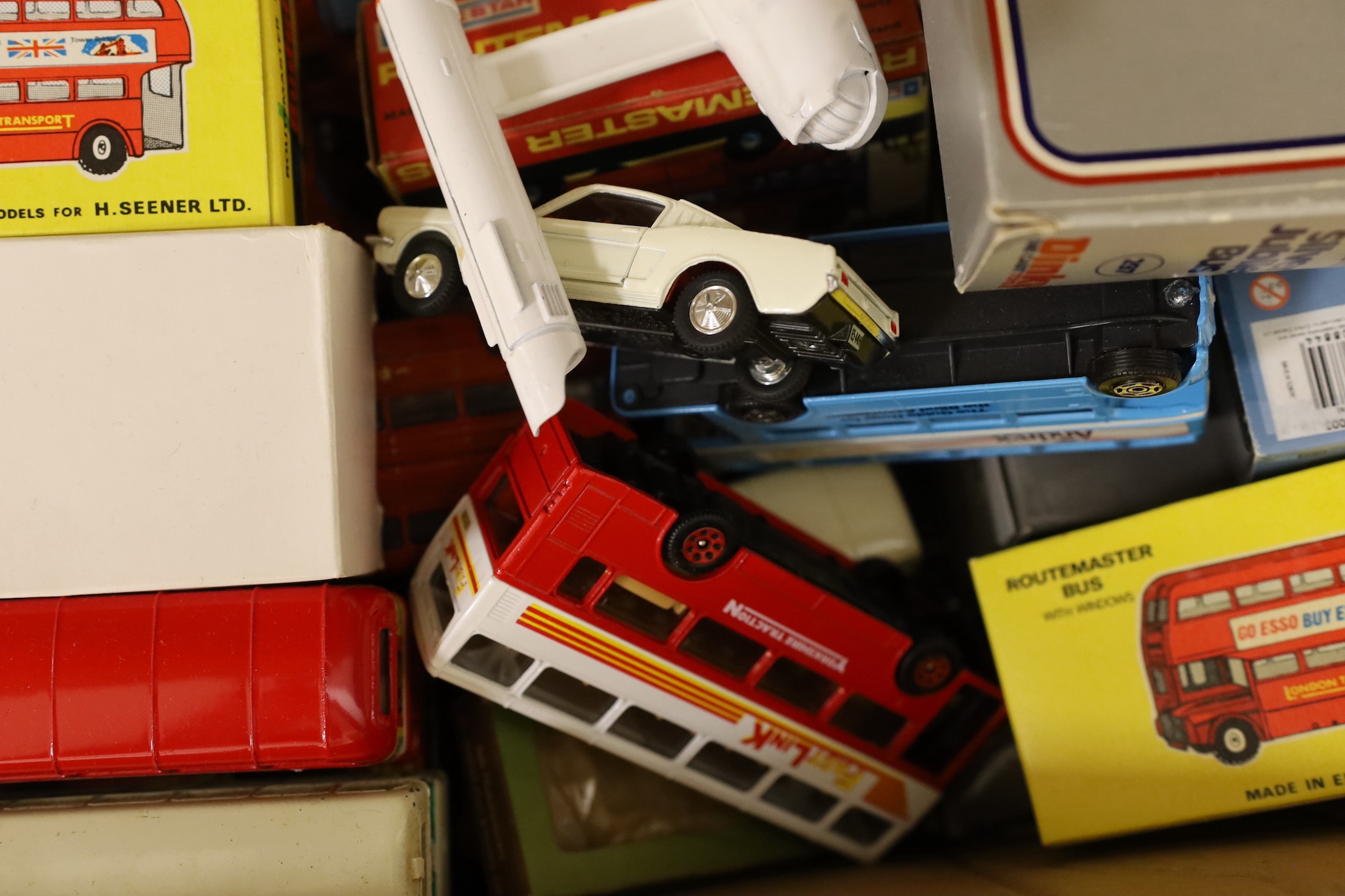 A quantity of die-cast toy vehicles and trains